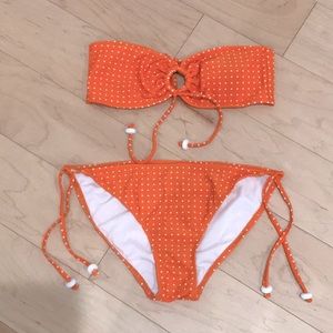 Orange and white polkadot bikini